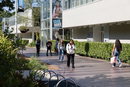 students walking on campus 