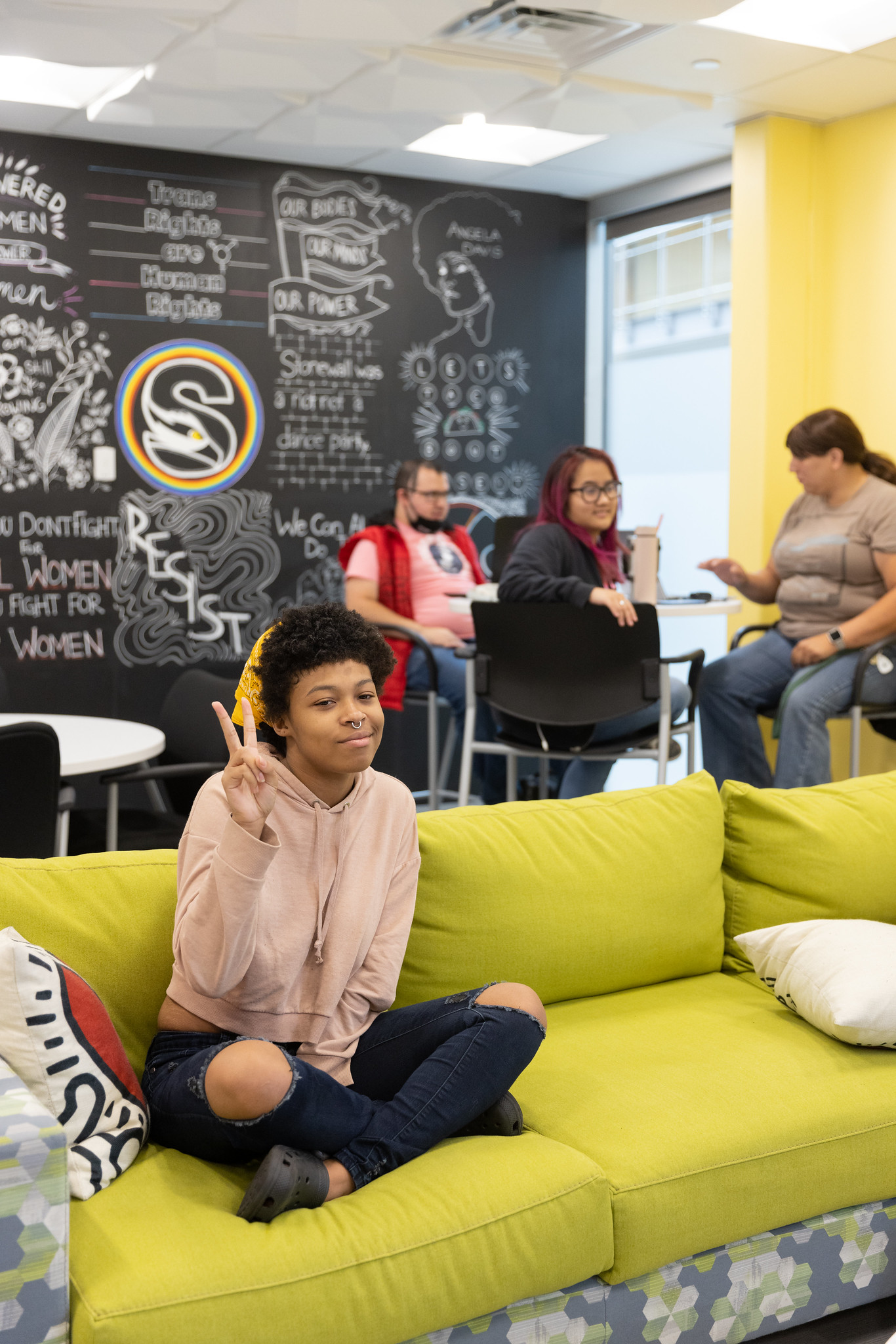 Student sitting in lounge